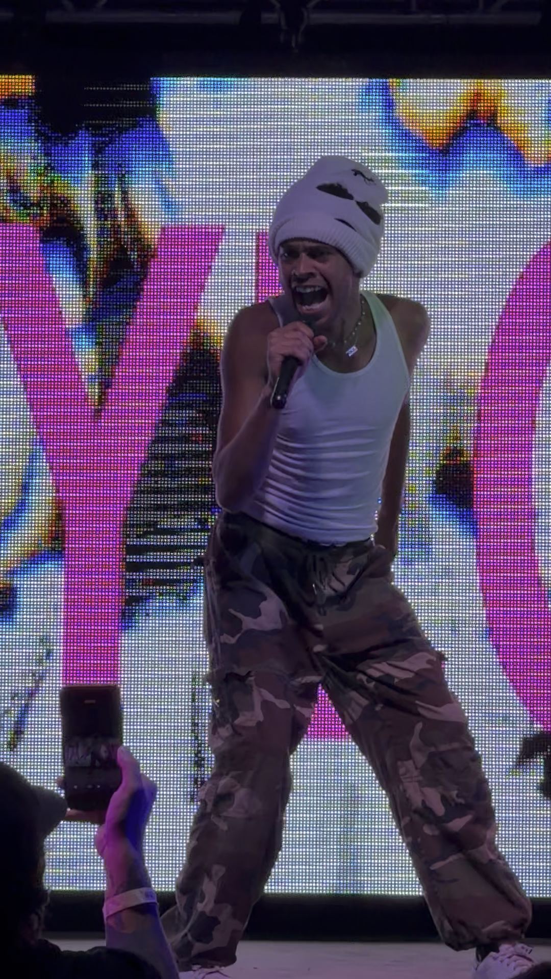 HAYLOVE with crowd against a white LED wall